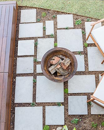 Paved firepit & outdoor lounge space
